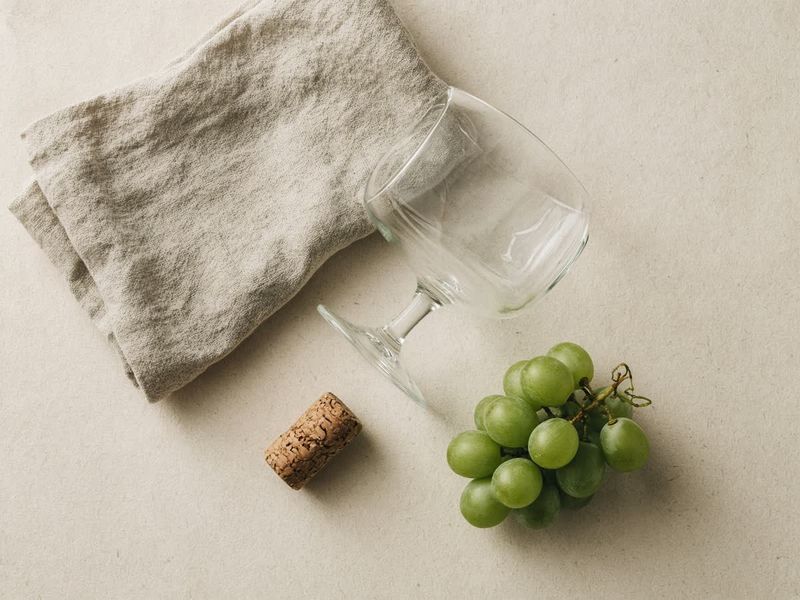 What to Wear to a Winery: Tasting Room vs Vineyard Photo — still life for this Occasions guide on Nonchallant
